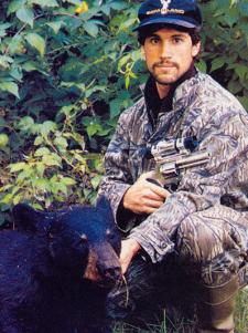 Doug Koenig's patience in the treestand finally paid of when he took this 225-pound bear running at 60 yards