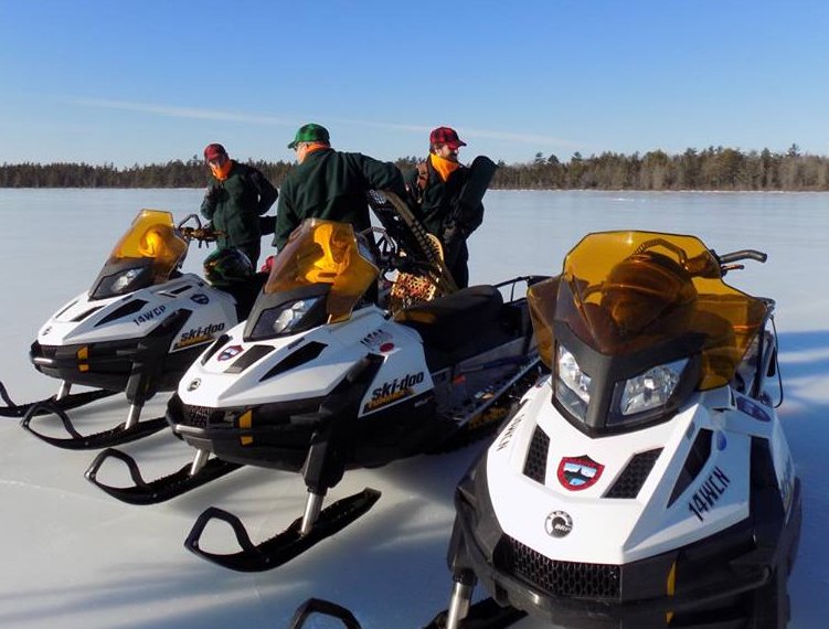 Maine wildlife biologists in winter