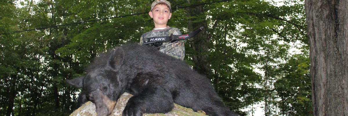 Ten year old boy took a nice Maine bear with his bow